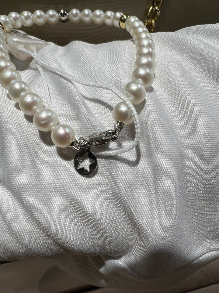 Bracciale perle e oro comete