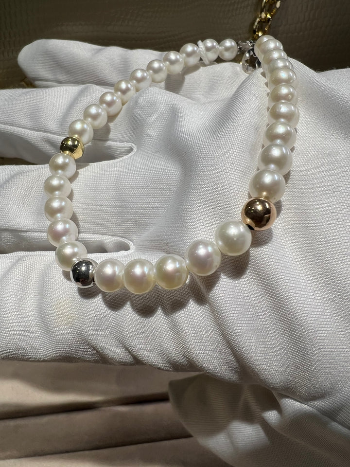 Bracciale perle e oro comete