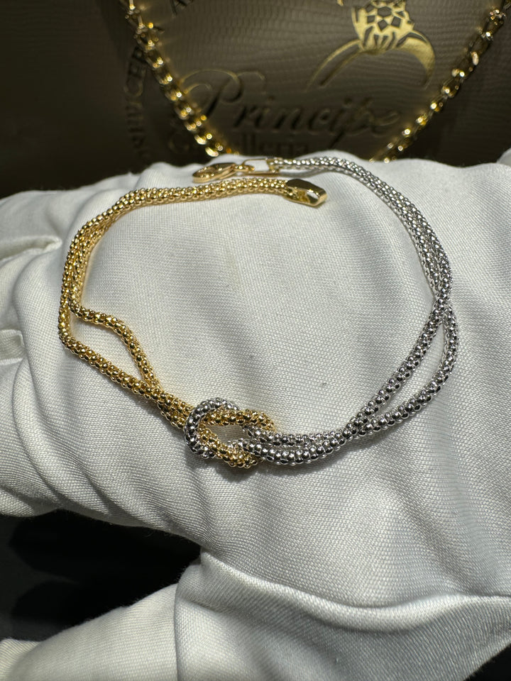 Bracciale nodo bicolore oro