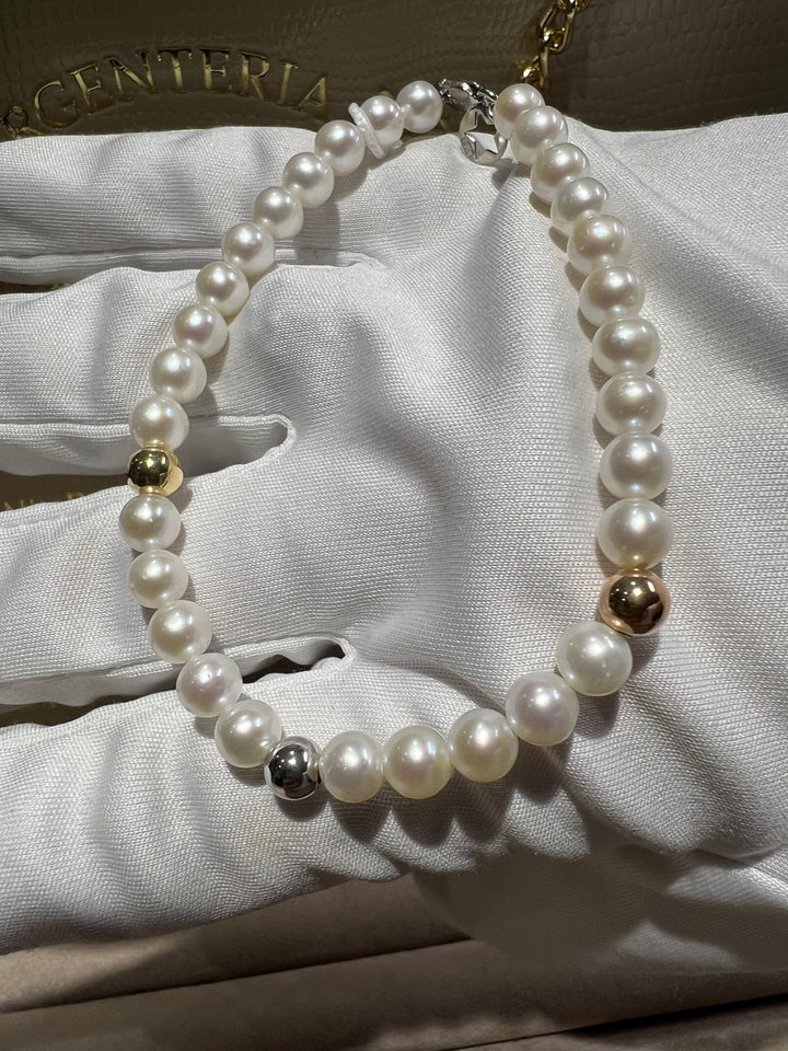 Bracciale perle e oro comete