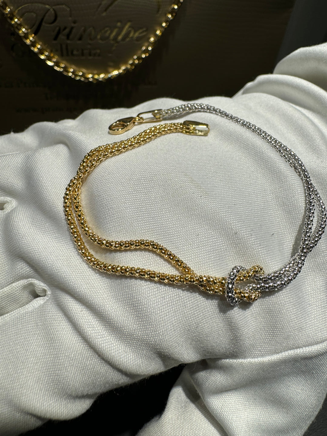 Bracciale nodo bicolore oro