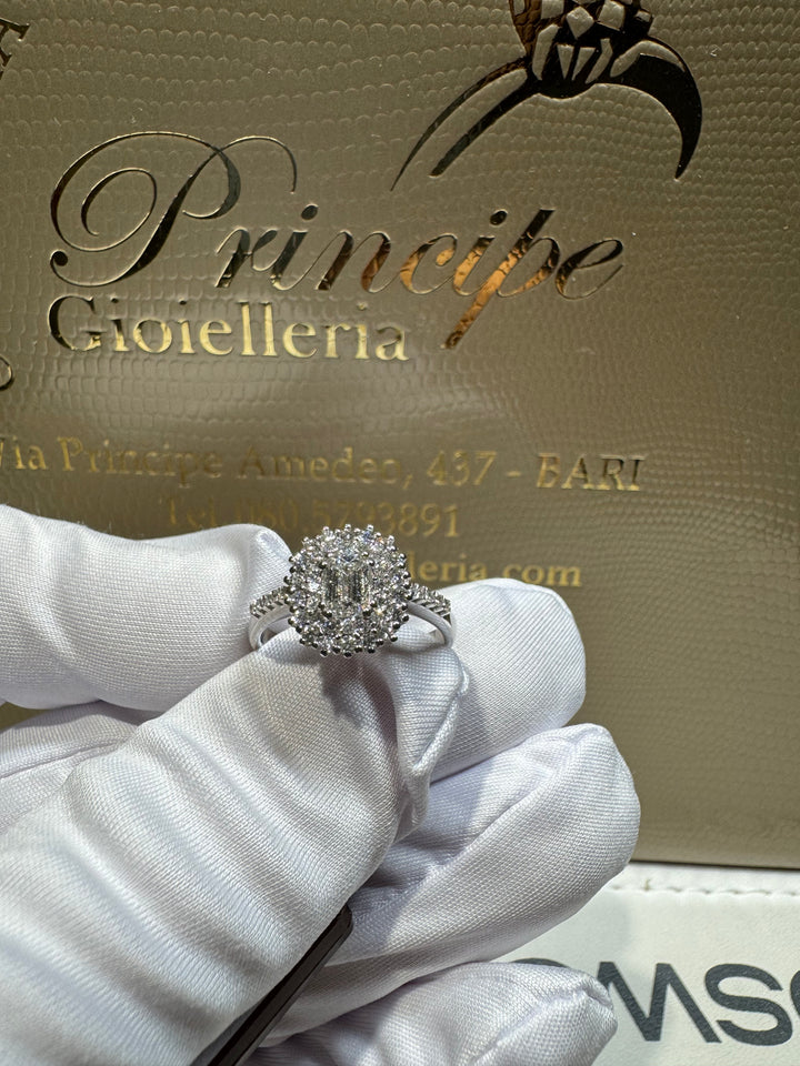 Anello taglio smeraldo doppio giro