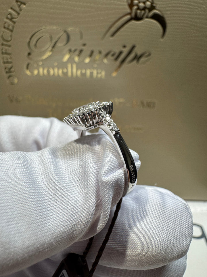 Anello taglio smeraldo doppio giro