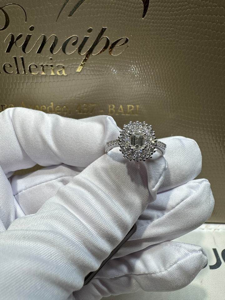 Anello taglio smeraldo doppio giro