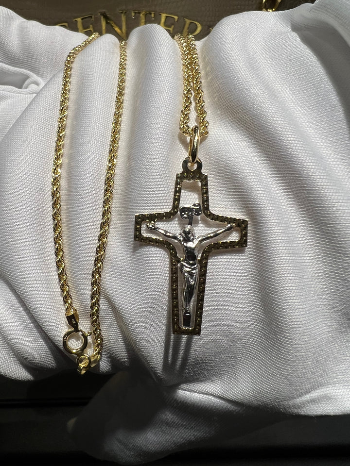 Collana croce bicolore con Cristo a rilievo